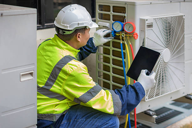 Professional Hvac Maintenance technician working in Ballwin, MO